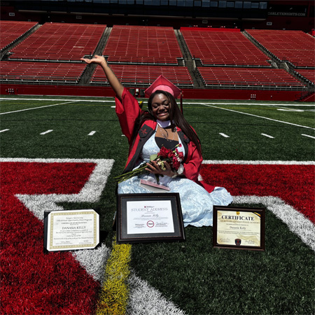 Danasia Kelly waving